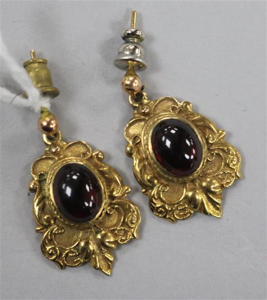 A pair of Victorian style 9ct gold and garnet set drop earrings.